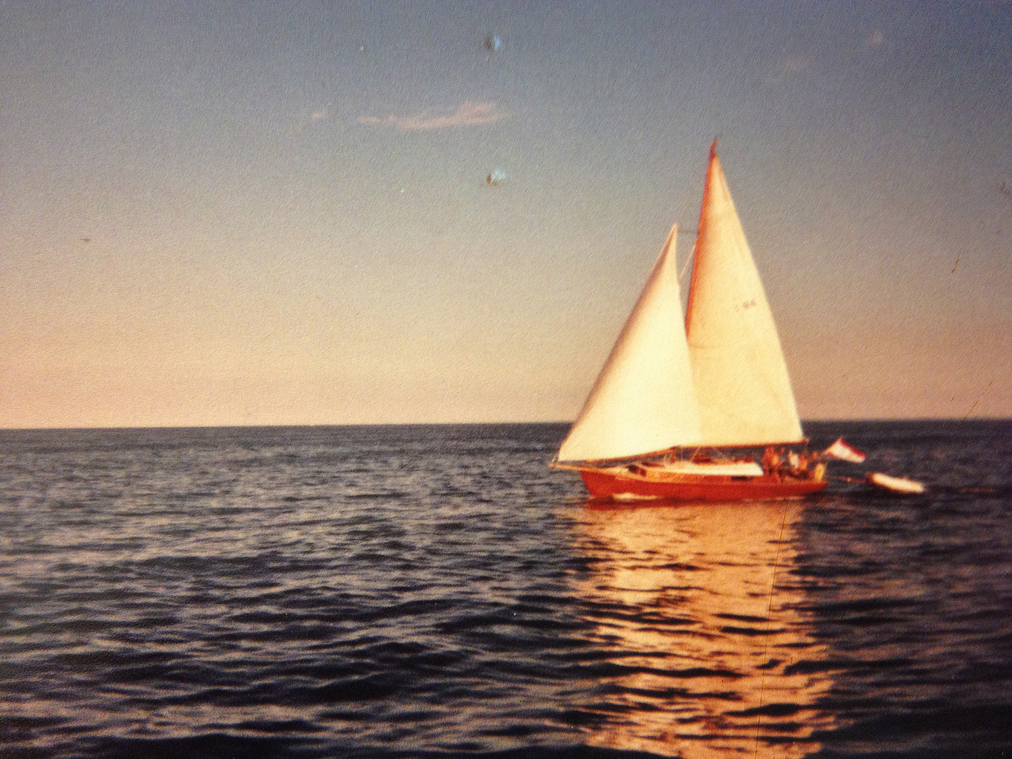 Vangogh wooden sailboat plowing the waters of Lake Erie.